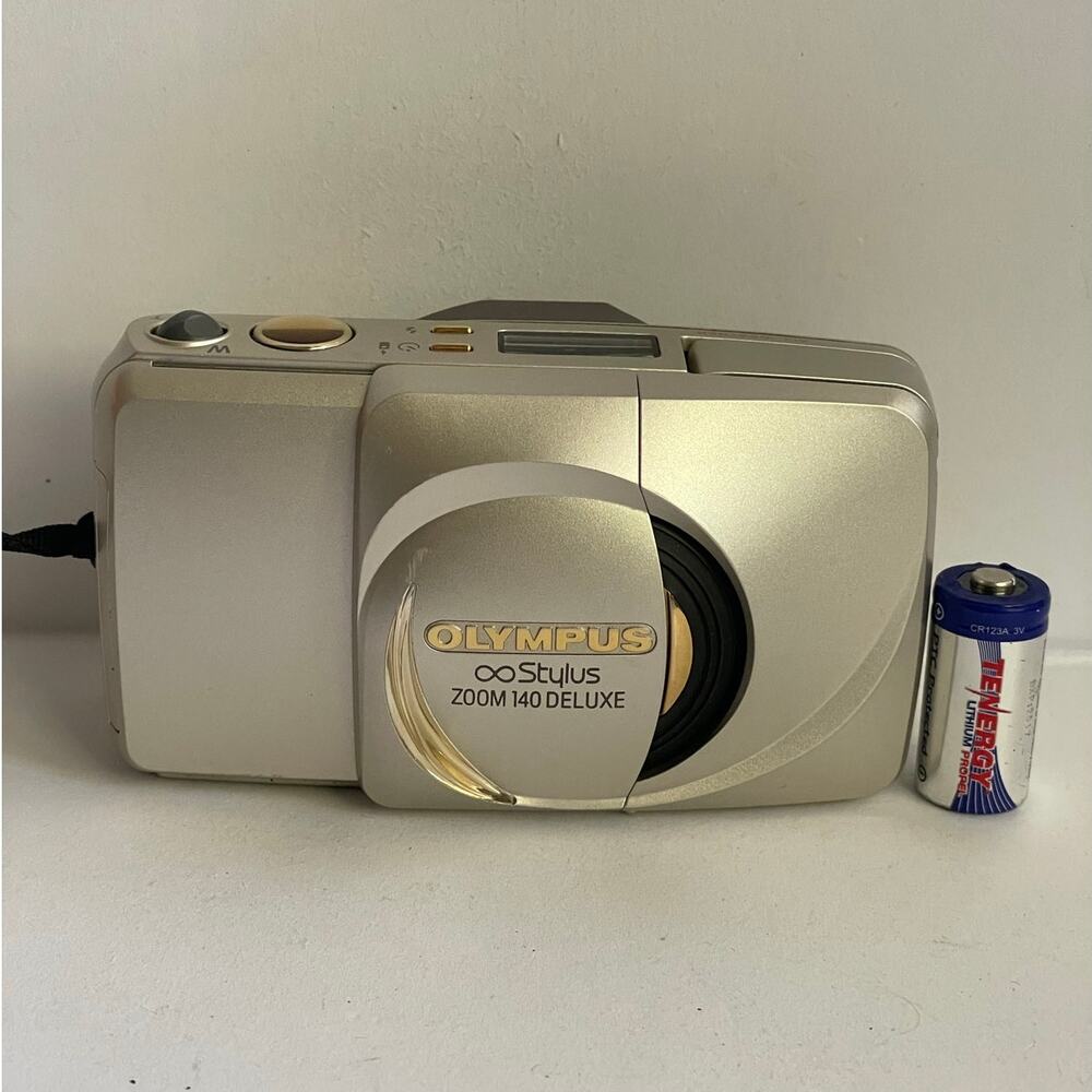 Olympus Infinity Stylus Zoom 140 Deluxe 35mm Point Film Camera  Silver/Gold